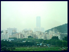 Dongguan is a large industrial city with 8.2 million inhabitants, situated between Shenzhen and Guangzhou and is part of Pearl River Delta Mega City. Several smaller cities have been merged with Dongguan. The building in the middle is the city's 2nd tallest, Huanghe River Center Building (230m, 62 floors, built 2009).